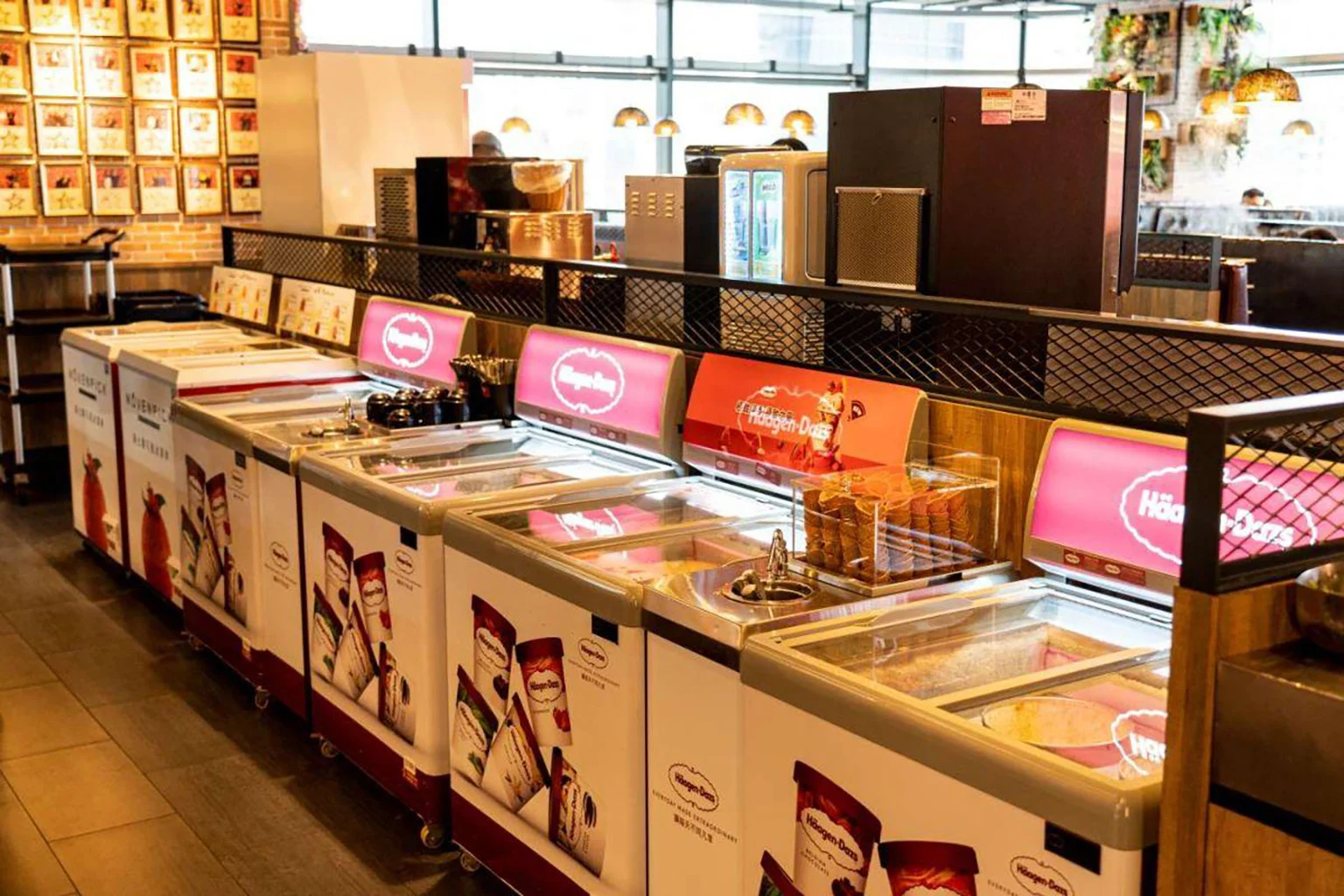 scoop ice cream freezers in a restaurant with cones on the freezer